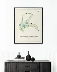 The Golf Club at Twin Creeks map print, framed in a room